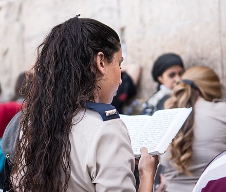 An Israeli female soldier prays at the Western Wall