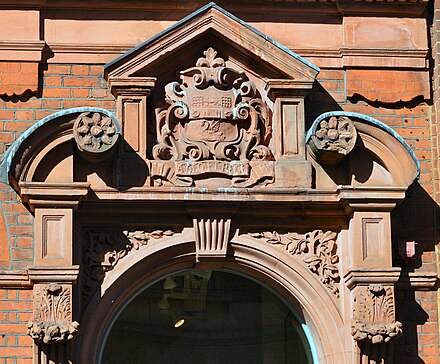 Facade of the former Post Office building in George Street, Richmond, showing the coat of arms of the former Municipal Borough of Richmond