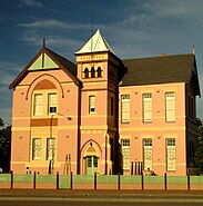 The former infants school was built in 1892, employing elements of the Victorian Gothic and Italianate style.