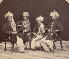 "Four sons of Nawruz Khan of Lalpoora", photograph by John Burke, 1878 Four Sons of Nawruz Khan of Lalpoora WDL11462 (cropped).png