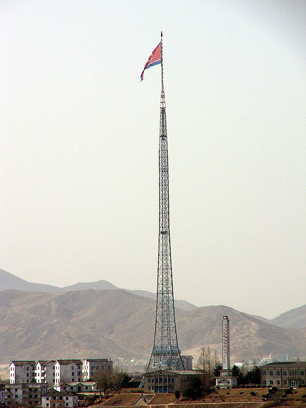 The world's sixth tallest flagpole flying a 270 kg (595 lb) Flag of North Korea. It is 160 m (525 ft) in height, over Kijŏng-dong ("Peace village") ne