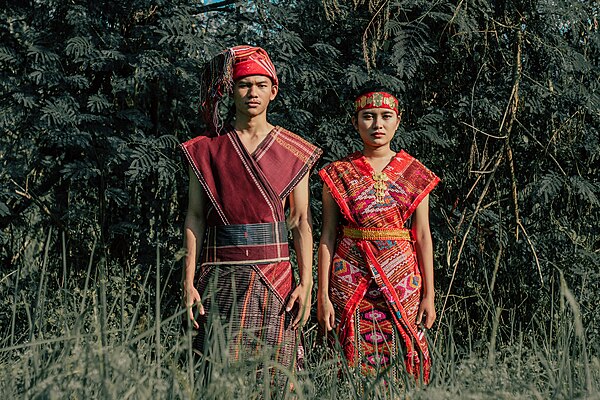 Toba Batak male and female wearing traditional clothes