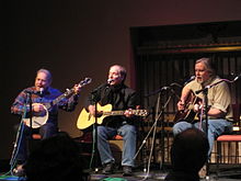 From left: Happy Traum, Artie Traum, and Ed Renehan performing at a reunion concert, Albany, 2008 Happy Traum Artie Traum Ed Renehan.jpg