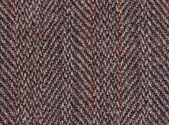 Tweed fabric in a herringbone weave, used for suits and hats