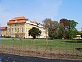 Čeština: Zámek v Horních Beřkovicích (pohled ze zámeckého parku). English: Castle in Horní Beřkovice (view from the park).