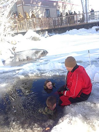 Two American marines participating in an immersion hypothermia exercise