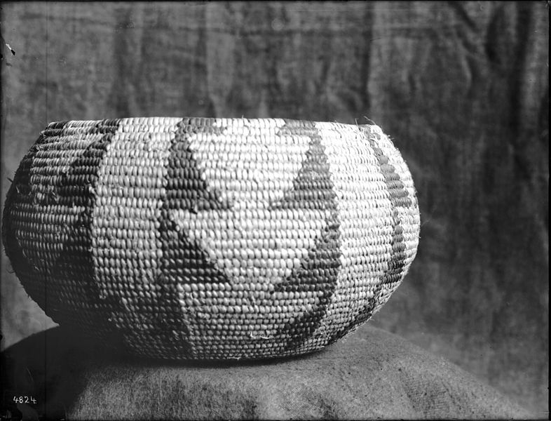 File:Indian basket displayed in front of a cloth backdrop, ca.1900 (CHS-4824).jpg