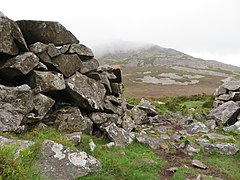 Inside the Celtic Iron Age hillfort of Tre'r Ceiri, Gwynedd Wales, with 150 houses; finest in N Europe 100.jpg