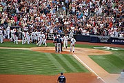 Derek Jeter joined the 3000 hit club with a solo homer off from Tampa Bay Rays' pitcher David Price at Yankee Stadium in July 2011. Jeter crosses home plate after 3000th.jpg