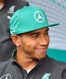 A picture of Lewis Hamilton donning Mercedes Grand Prix attire.