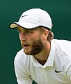 Liam Broady competing in the first round of the 2015 Wimbledon Championships.