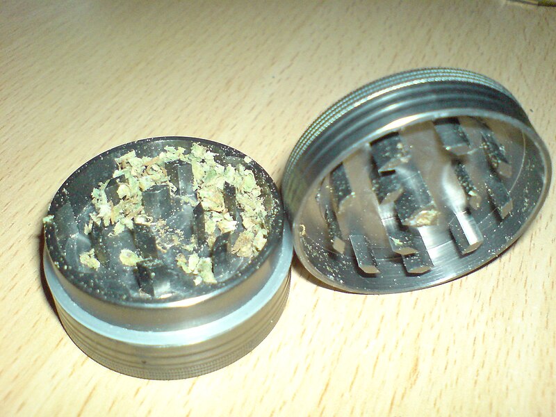 File:Metal herb grinder-cannabis inside.JPG