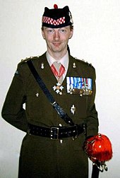 Alan Mcilwraith, who falsely claimed to be a highly decorated British Army officer (2005). His uniform and medals were purchased online. MilitaryPro userpage photo.jpg