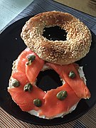 Bagel with lox, cream cheese, and capers