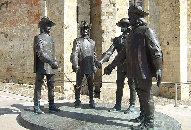 Sculpture of d'Artagnan, Athos, Porthos and Aramis in Condom, France