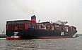 The new container ship APL Merlion starting port of Hamburg on the Elbe