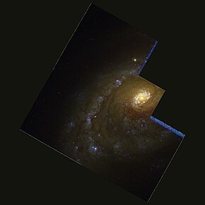 Spirální galaxie NGC 5248 na snímku z Hubbleova vesmírného dalekohledu. Autor: ESA/NASA.