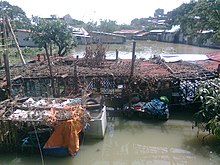 A small plantation in the Philippines flooded by the typhoon. Ondoy in rizal.jpg