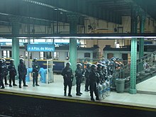 Argentine Federal Police at a train station in the Buenos Aires Underground PFA Subterraneo EstOnce.JPG