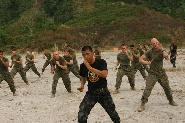 A Philippine Marine Corps instructor teaches US Marines "Pekiti-Tirsia Kali", a Philippine martial art, during military exercises