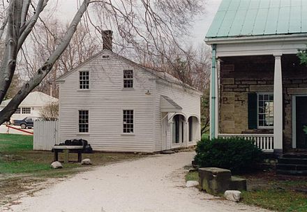 This building, the former woodshed, houses staff offices and is located behind the Perkins Stone Mansion. PSMOffice.JPG