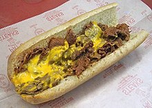 Philadelphia cheesesteak "wiz wit"--that is, with steak, Cheez Whiz, and onions PatsCheesesteak.jpg