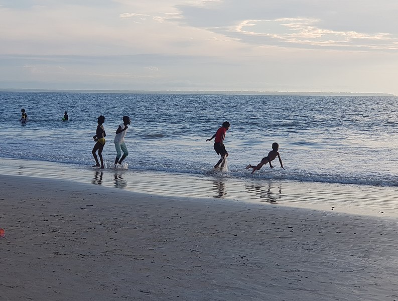 File:Playing by the coastline in Libreville.jpg