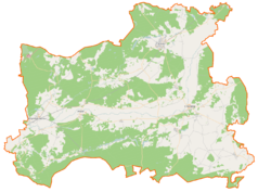 Mapa konturowa powiatu czarnkowsko-trzcianeckiego, po lewej nieco na dole znajduje się punkt z opisem „Parafia Najświętszego Serca Pana Jezusa”