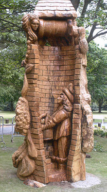 A sweet chestnut carved by English artist Steve Field to commemorate the English Civil War, and depicting Prince Rupert hiding from the Roundheads in the well at Wollescote Hall in Stourbridge, West Midlands Prince Rupert in Well - Steve Field.jpg