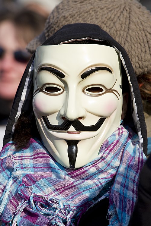 A protester in a Guy Fawkes mask, created by David Lloyd for 1982–89's V for Vendetta