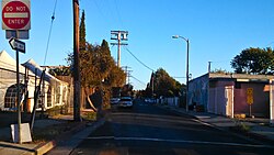 A residential street of Watts, Los Angeles Residental Street in Watts LA.jpg