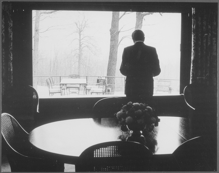 File:Richard M. Nixon standing in front of a window inside the Camp David lodge. - NARA - 194468.tif