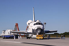 Atlantis is towed to Orbiter Processing Facility-1