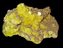 Native sulfur crystals. Sulfur occurs naturally as elemental sulfur, in sulfide and sulfate minerals and in hydrogen sulfide. Schwefel 01.jpg