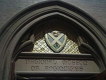 The coat of arms of the Society of Antiquaries of Scotland, above the entrance to the former National Museum of Antiquities, at the Scottish National Portrait Gallery. Scottish National Portrait Gallery - crest above Society of Antiquaries entrance.jpg