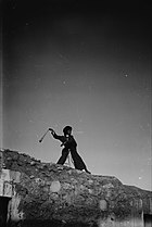 Arab shepherd boy using a sling, c. 1900-1920, Jerusalem Shepherd boy slinging (LC-DIG-matpc-05262).jpg