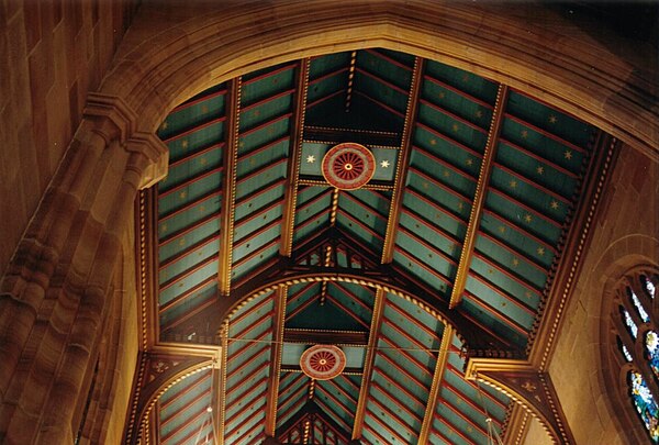 Bright colours such as those on the hammer-beam roof at St Andrew's Cathedral were advocated by Augustus Welby Pugin.