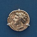 Syrakosai - 413-400 BC - silver dekadrachm - charioteer driving quadriga and Nike - head of Arethousa - London BM G-4630