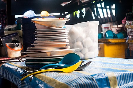 The plantains have been fried, the eba has been made, food dished out in heat preserving coolers, and plates and cutleries kept in place as customers begin to trickle in.