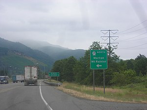 U.S. Route 12 eastbound approaching SR 7's southern terminus, which includes a sign with the control cities of Morton and Mount Rainier.