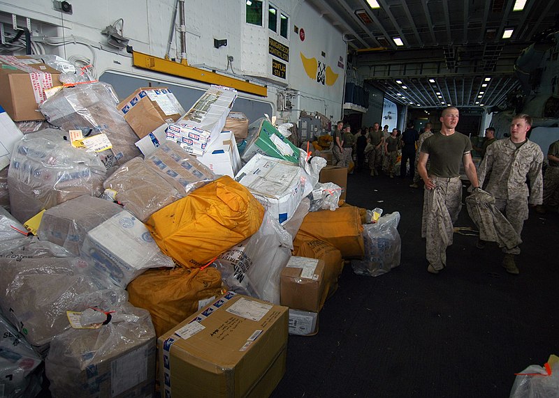 File:US Navy 060829-N-6403R-012 Piles of mail sit in the hangar bay after a vertical replenishment (VERTREP) with the Military Sealift Command (MSC) combat stores ship USNS Saturn (T-AFS 10).jpg