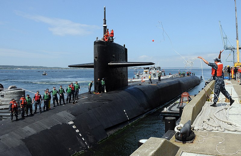 File:US Navy 110608-N-GU530-161 A Sailor throws a heaving line to line handlers aboard the Ohio-class guided-missile submarine USS Michigan (SSGN 727) a.jpg