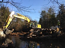 Removal of the Westecunk Creek Barrier from Westecunk Creek at the Edwin B. Forsythe National Wildlife Refuge in 2015. Westecunk Creek Barrier - During Removal, Eagleswood N.J. (24255468351).jpg