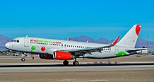 A VivaAerobús Airbus A320-232 (XA-VAE) in an old livery at McCarran International Airport in Las Vegas.