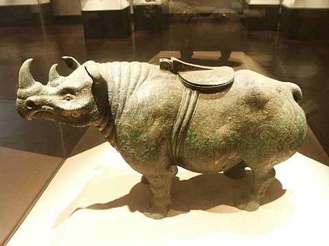 A Chinese Western Han dynasty (202 BCE – 9 CE) bronze rhinoceros with gold and silver inlay