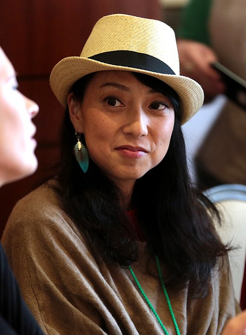 Yuko Miyamura, Asuka Langley Soryu's voice actress. Her performance influenced the writing of the final line.