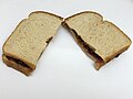2020-05-04 23 52 06 A peanut butter and jelly sandwich cut in two, composed of Sara Lee white whole grain bread, Welch's concord grape jelly and Jif peanut butter in the Franklin Farm section of Oak Hill, Fairfax County, Virginia.jpg