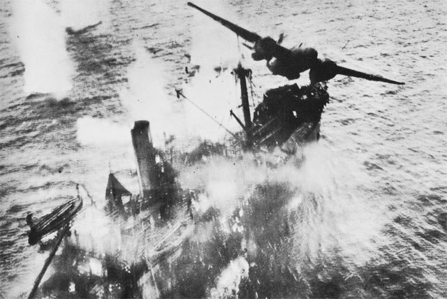 U.S. A-20 Havoc of the 89th Squadron, 3rd Attack Group, at the moment it clears a Japanese merchant ship Taiei Maru following a successful skip bombin