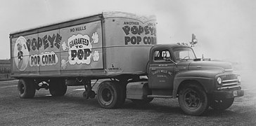 A "Popeye" popcorn truck with a colorful advertising design - NARA - 283764 (cropped).jpg