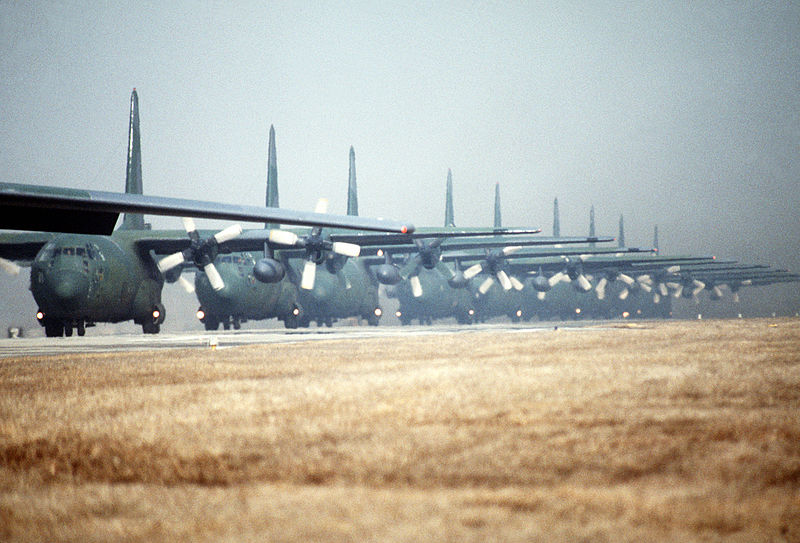 File:A row of C-130 Hercules aircraft wait on the runway before taking off for an airdrop during Exercise Team Spirit '86 DF-ST-87-09716.jpg